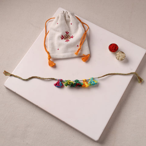 Anant Raksha Thread Work Rakhi with Soof Hand Embroidered Potli 18