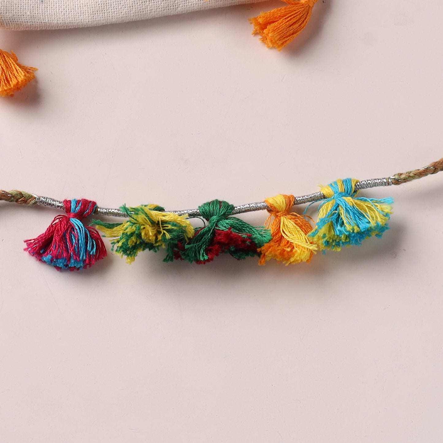 Anant Raksha Thread Work Rakhi with Soof Hand Embroidered Potli 18