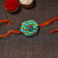  Twisted Rose - Handmade Blue Mango Rakhi 