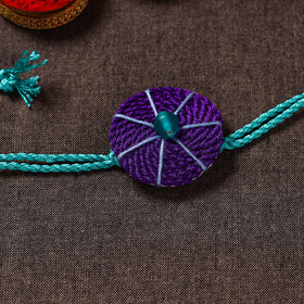  Thread Flower - Handmade Blue Mango Rakhi 