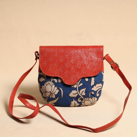  Handcrafted Kalamkari Printed Sling Bag with Embossed Leather Flap 