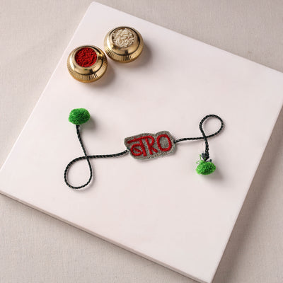 BRO - Reusable Handmade Thread Work Rakhi with Potli by Jugni 02