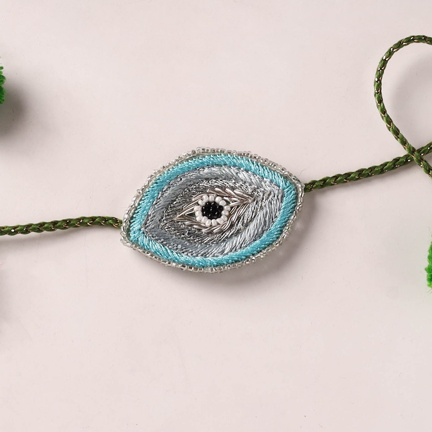Evil Eye - Reusable Handmade Thread & Beadwork Rakhi with Potli By Jugni 03