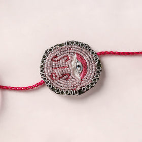 Sis - Reusable Handmade Thread & Beadwork Rakhi with Potli By Jugni 05