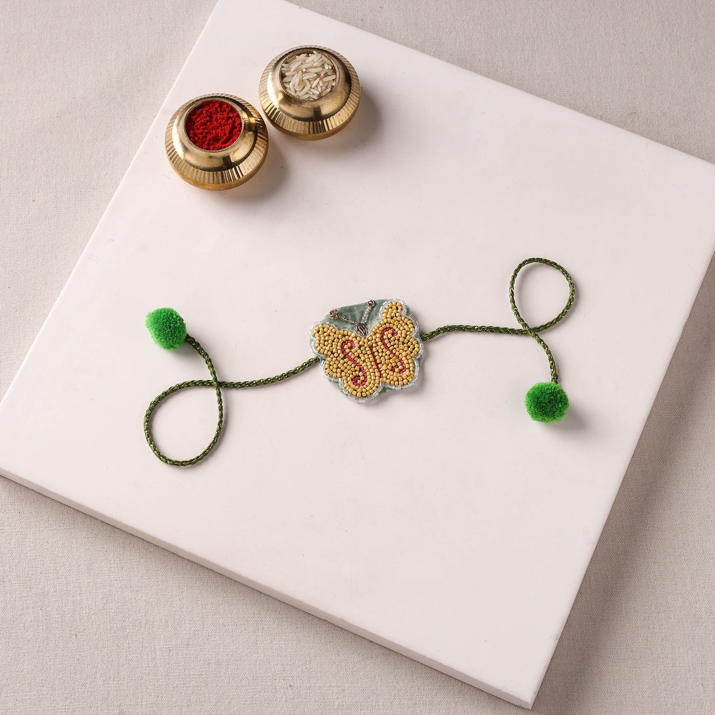 Butterfly - Reusable Handmade Thread & Beadwork Rakhi with Potli By Jugni 07