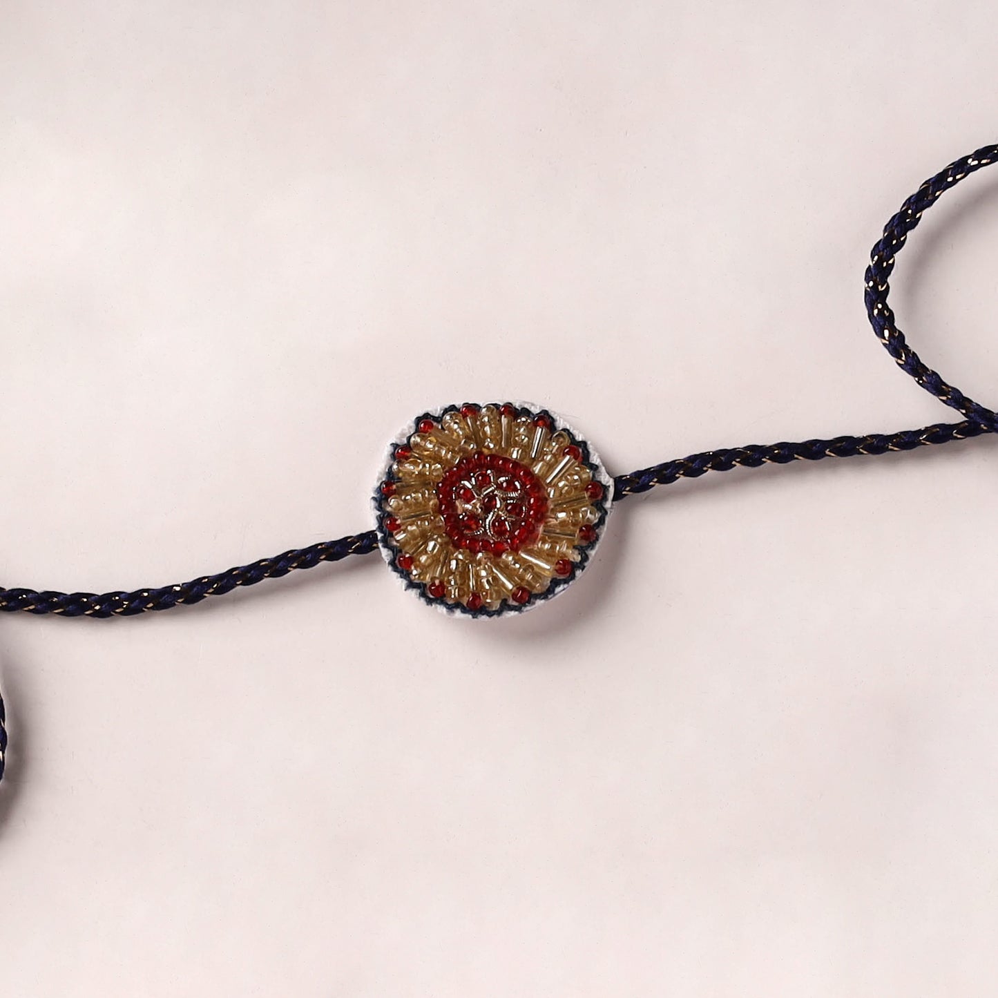 Flower - Reusable Handmade Thread & Beadwork Rakhi By Jugni 09