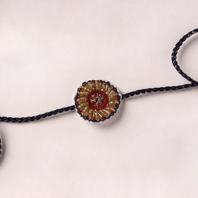 Flower - Reusable Handmade Thread & Beadwork Rakhi By Jugni 09