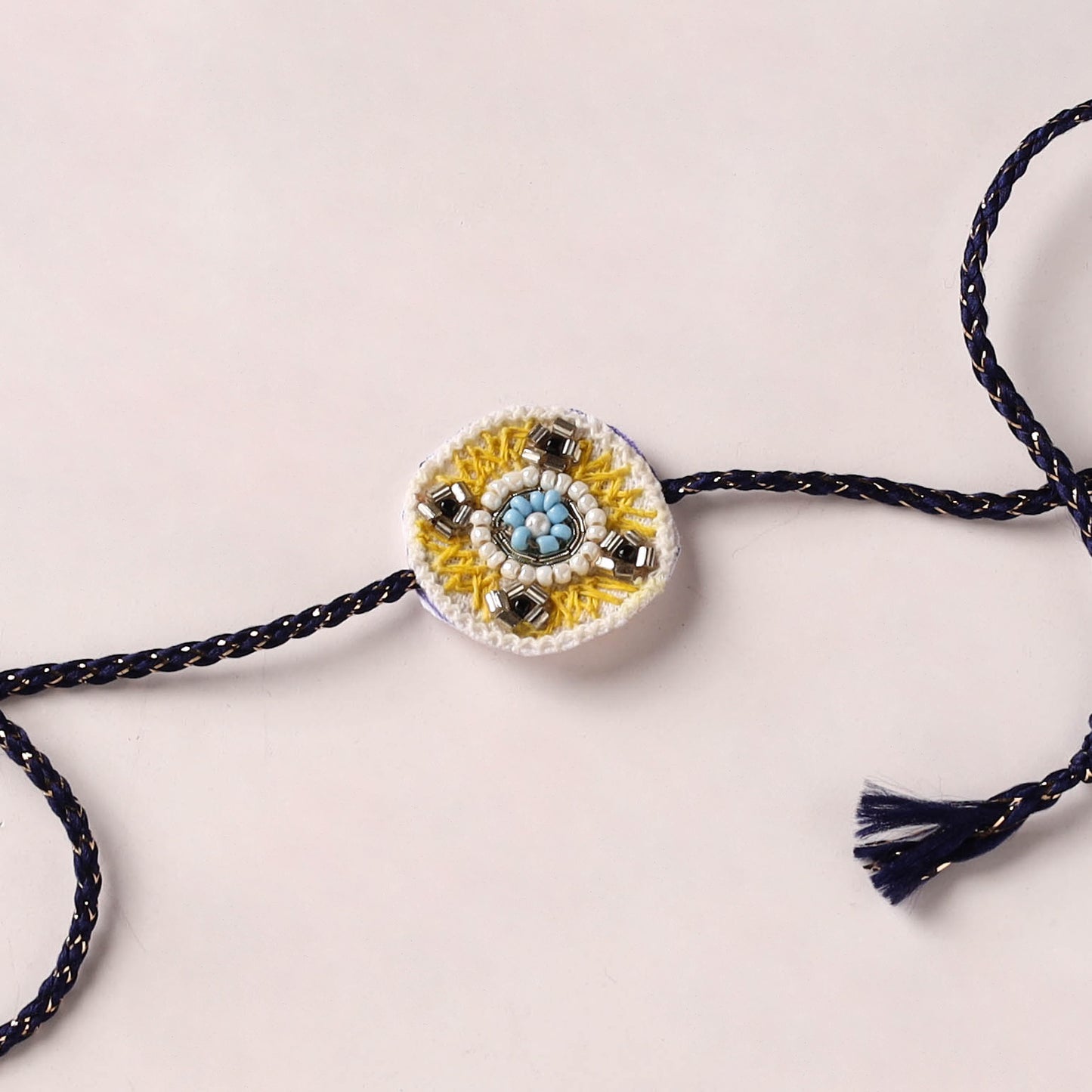 Flower - Reusable Handmade Thread & Beadwork Rakhi with Potli By Jugni 10