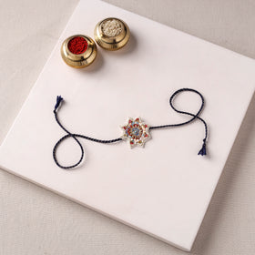 Flower - Reusable Handmade Thread & Beadwork Rakhi with Potli By Jugni 11