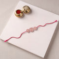 Reusable Handmade Thread & Beadwork Rakhi with Potli By Jugni 15