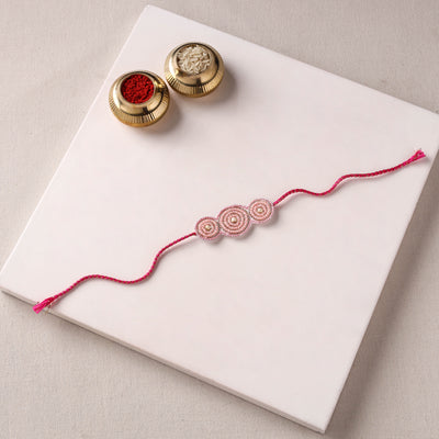 Reusable Handmade Thread & Beadwork Rakhi with Potli By Jugni 15
