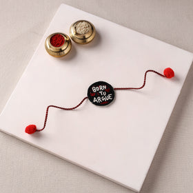 Born To Argue - Reusable Handmade Thread & Beadwork Rakhi with Potli By Jugni 08