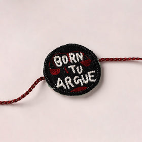 Born To Argue - Reusable Handmade Thread & Beadwork Rakhi with Potli By Jugni 08