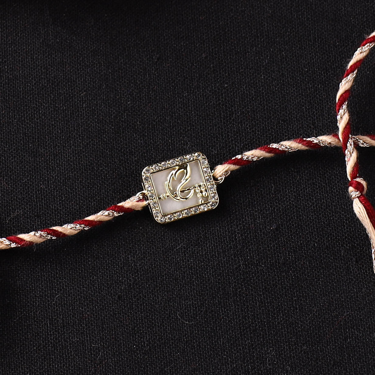 Handcrafted Kundan Rakhi for Brother with Potli 01