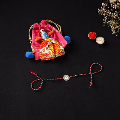 Handcrafted Kundan Rakhi for Brother with Potli 02