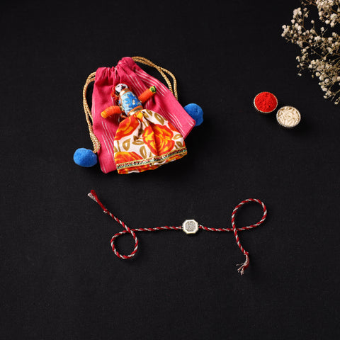 Handcrafted Kundan Rakhi for Brother with Potli 03