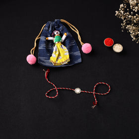 Handcrafted Kundan Rakhi for Brother with Potli 05