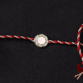 Handcrafted Kundan Rakhi for Brother with Potli 05