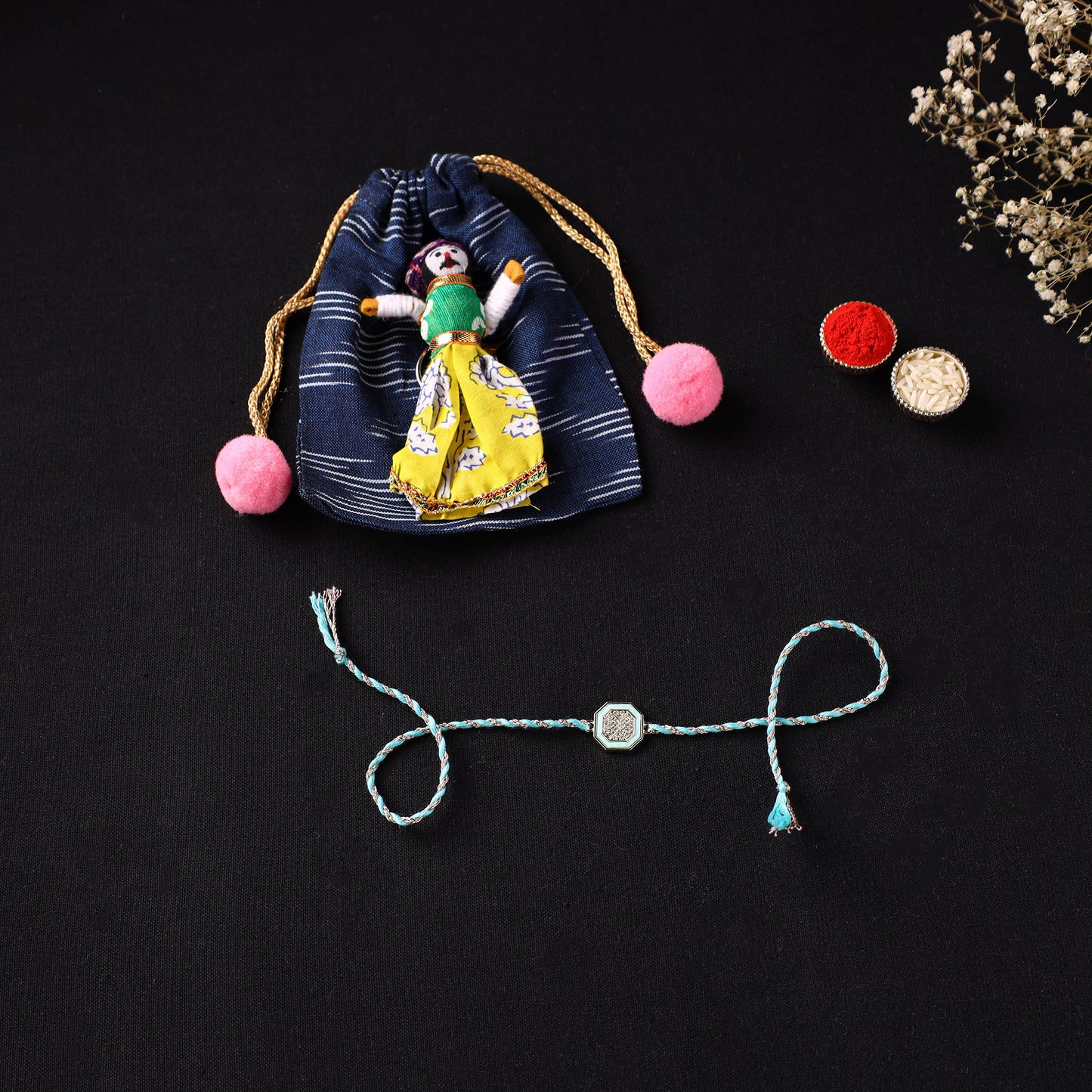 Handcrafted Kundan Rakhi for Brother with Potli 06