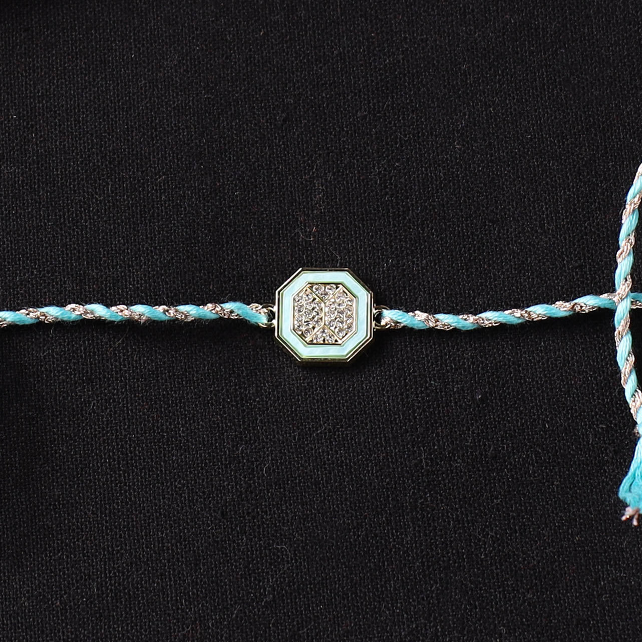 Handcrafted Kundan Rakhi for Brother with Potli 06