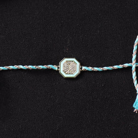 Handcrafted Kundan Rakhi for Brother with Potli 06