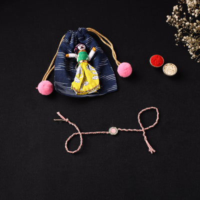 Handcrafted Kundan Rakhi for Brother with Potli 07