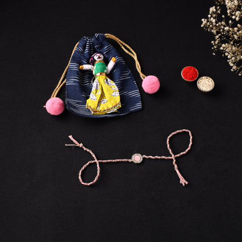 Handcrafted Kundan Rakhi for Brother with Potli 07