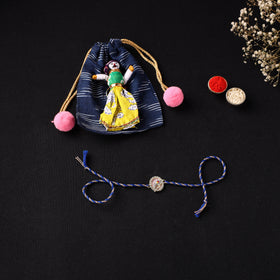 Handcrafted Kundan Rakhi for Brother with Potli 08