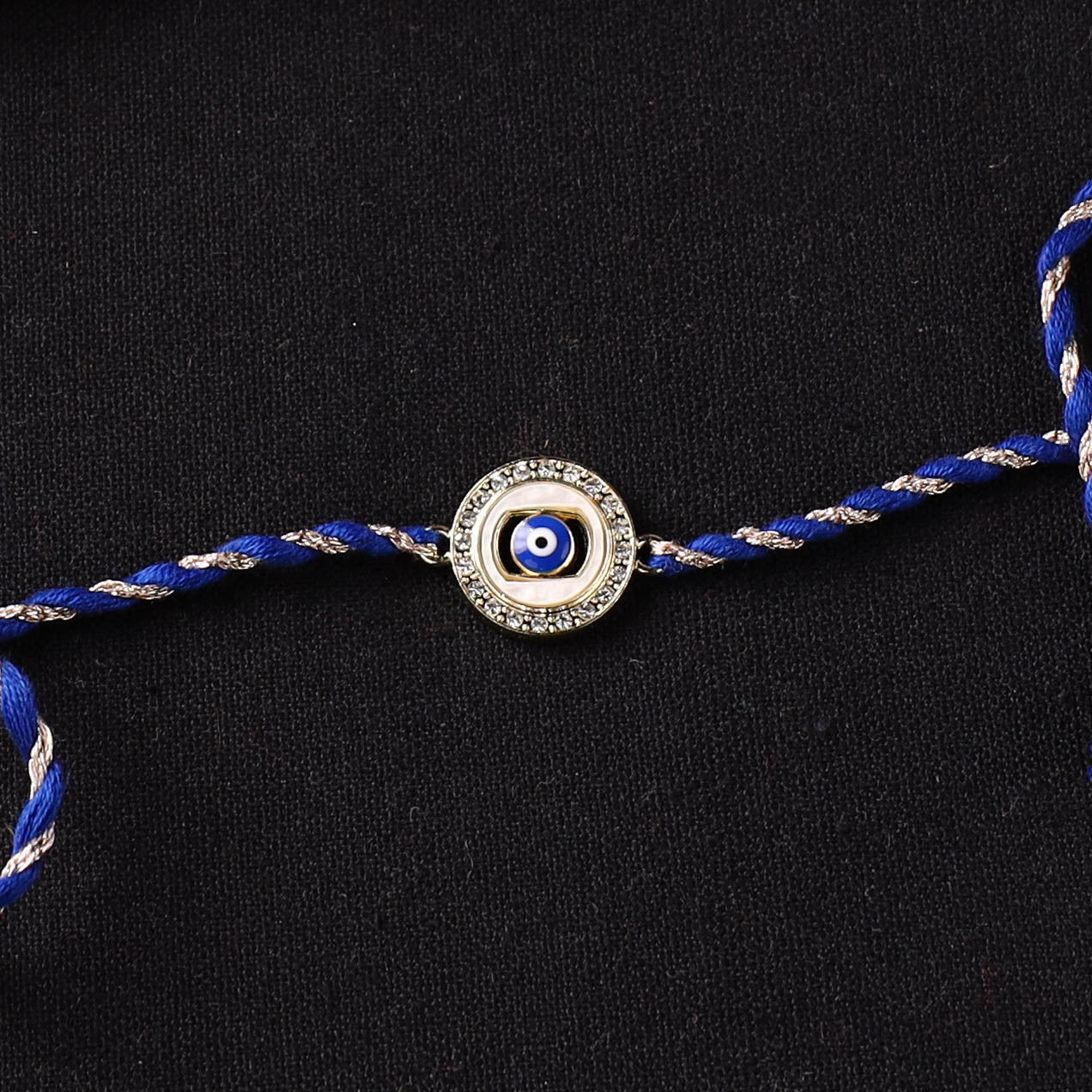 Handcrafted Kundan Rakhi for Brother with Potli 09