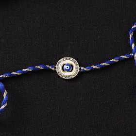 Handcrafted Kundan Rakhi for Brother with Potli 09