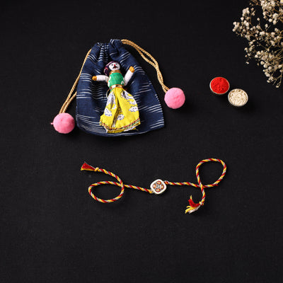 Handcrafted Kundan Rakhi for Brother with Potli 10
