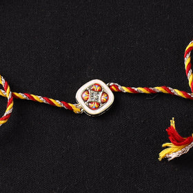 Handcrafted Kundan Rakhi for Brother with Potli 10