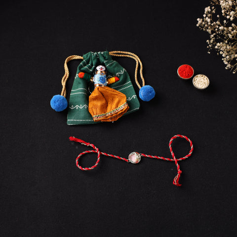 Handcrafted Kundan Rakhi for Brother with Potli 12