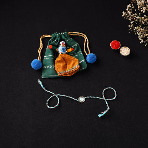 Handcrafted Kundan Rakhi for Brother with Potli 13