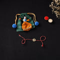 Handcrafted Kundan Rakhi for Brother with Potli 14