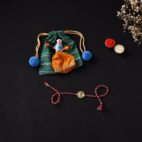 Handcrafted Kundan Rakhi for Brother with Potli 14