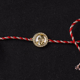 Handcrafted Kundan Rakhi for Brother with Potli 14