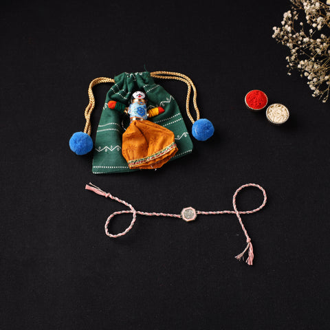 Handcrafted Kundan Rakhi for Brother with Potli 15