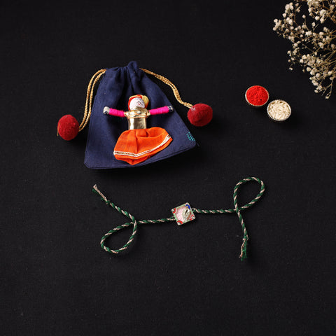 Handcrafted Kundan Rakhi for Brother with Potli 16