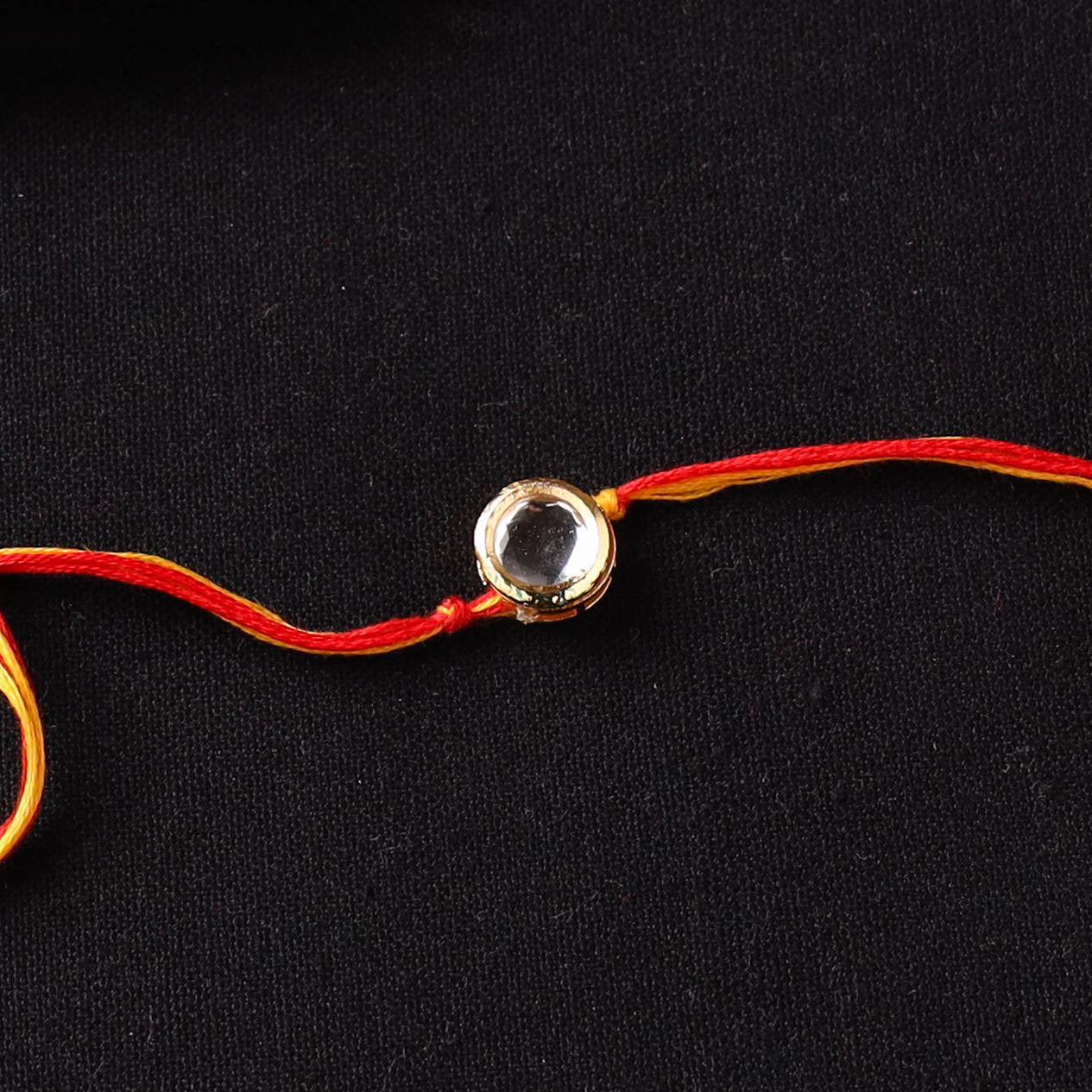 Handcrafted Kundan Rakhi for Brother with Potli 17
