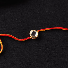 Handcrafted Kundan Rakhi for Brother with Potli 17