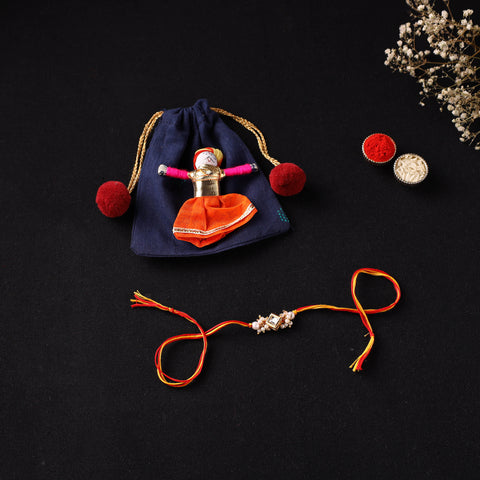 Handcrafted Kundan Rakhi for Brother with Potli 18