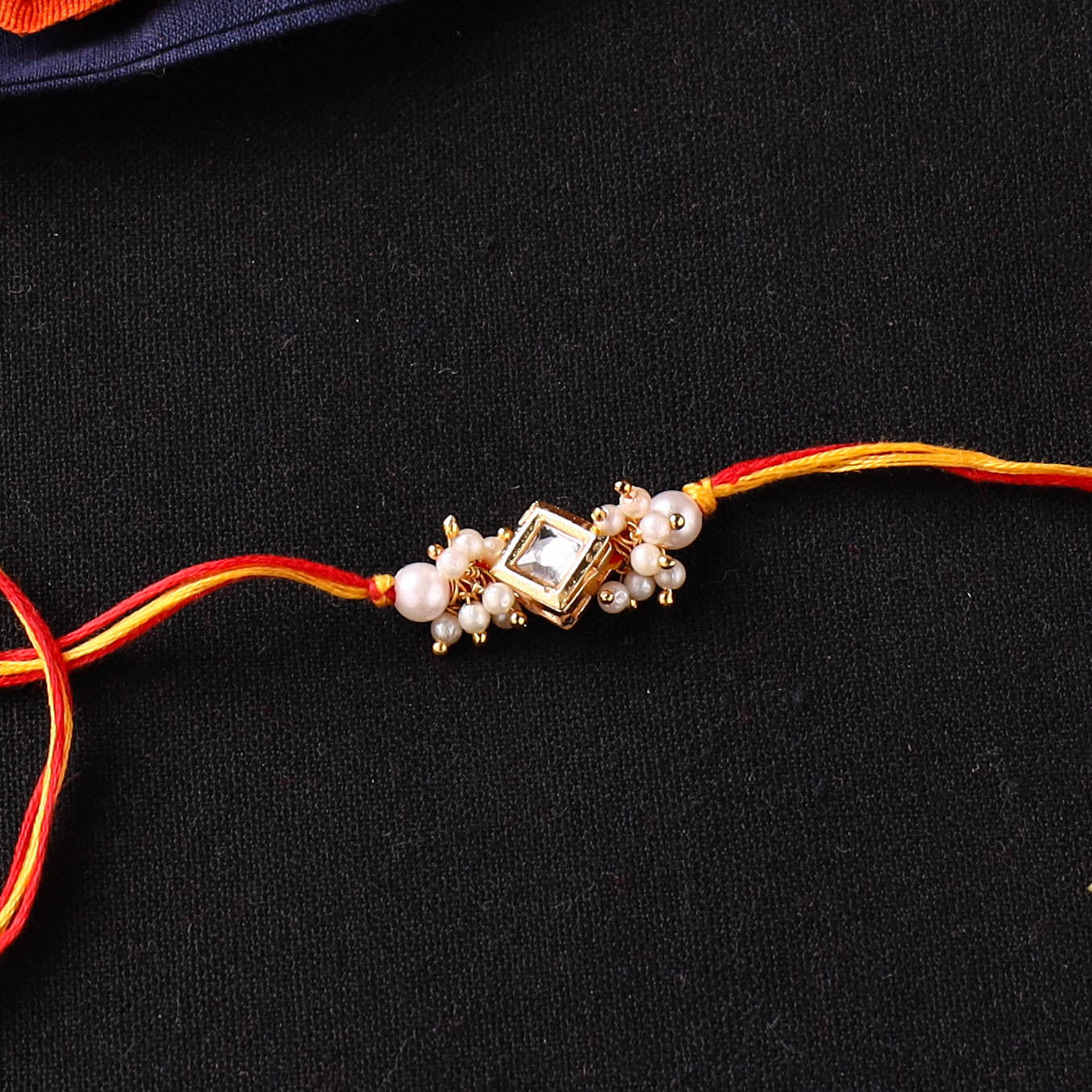Handcrafted Kundan Rakhi for Brother with Potli 18