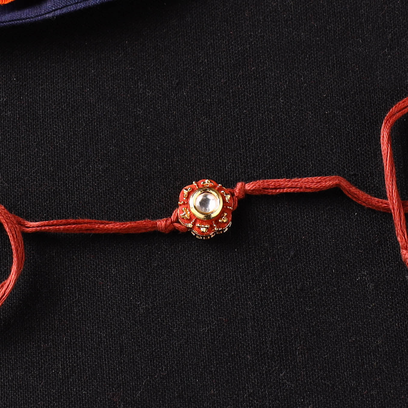 Handcrafted Kundan Rakhi for Brother with Potli 19