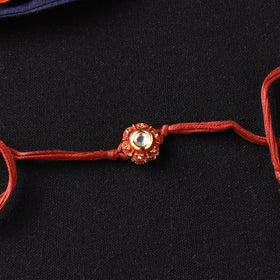Handcrafted Kundan Rakhi for Brother with Potli 19