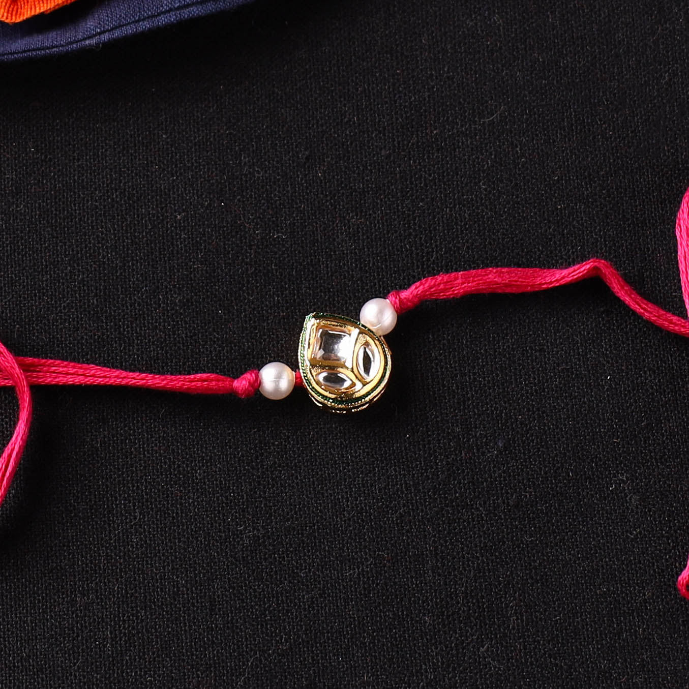 Handcrafted Kundan Rakhi for Brother with Potli 20