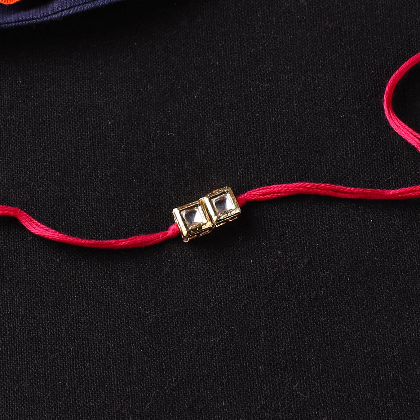 Handcrafted Kundan Rakhi for Brother with Potli 21