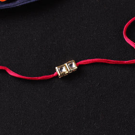 Handcrafted Kundan Rakhi for Brother with Potli 21
