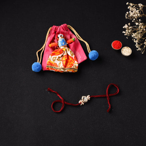 Handcrafted Kundan Rakhi for Brother with Potli 23