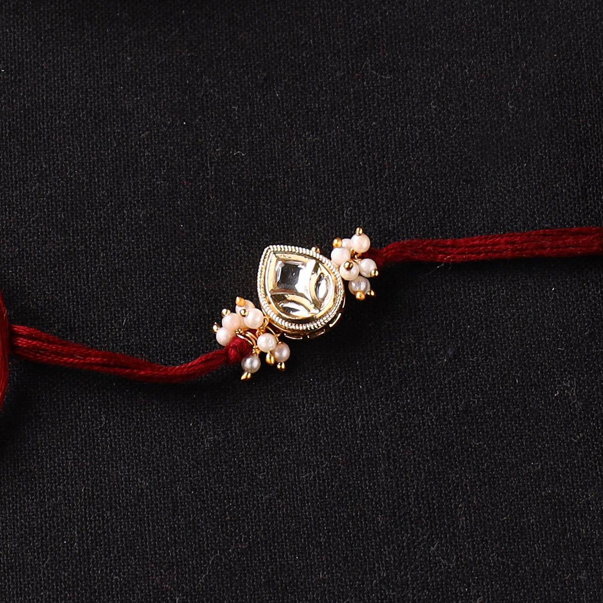 Handcrafted Kundan Rakhi for Brother with Potli 23